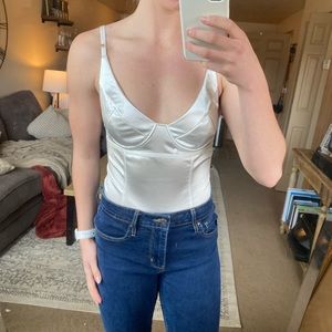 White silky bodysuit